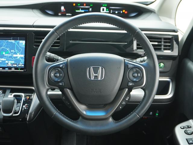 ステップワゴンスパーダ ｅ：ＨＥＶスパーダＧホンダセンシング　ワンオーナー　９インチナビ　フリップダウンモニター　バックカメラ　ドラレコ　ＥＴＣ２．０　アダプティブクルーズコントロール　両側電動スライドドア　ＬＥＤヘッドライト　純正アルミホイール　禁煙車（49枚目）