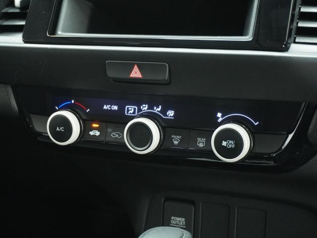 フィット ベーシック　ＣＤチューナー　ＥＴＣ　マニュアルエアコン　パワーウインドウ　パワーステアリング　スマートキー　アイドリングストップ　電動格納ドアミラー　横滑り防止装置　ＡＢＳ　サイドエアバッグ（61枚目）