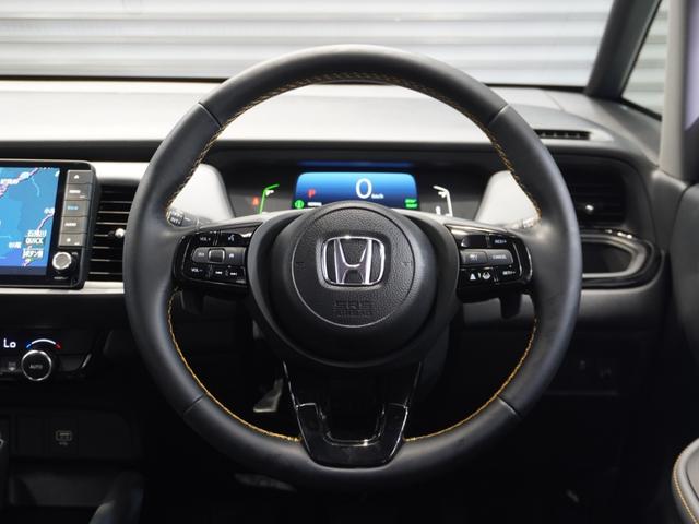 フィット ｅ：ＨＥＶＲＳ　当社デモカー　純正メモリーナビ　ホンダセンシング　ＬＥＤヘッドライト　ＥＴＣ　ドライブレコーダー　Ｕ－ＳｅｌｅｃｔＰｌｅｍｉｕｍ２年間走行無制限保証（33枚目）