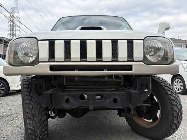 ジムニー ランドベンチャー 前席パワーウインドウ リフトアップ車 助手席エアバック 運転席エアバッグ 革シート 4WD車 キーレス付 PS 衝突安全ボディ ABS付 シートヒータ ETC ATエアコン(5枚目)