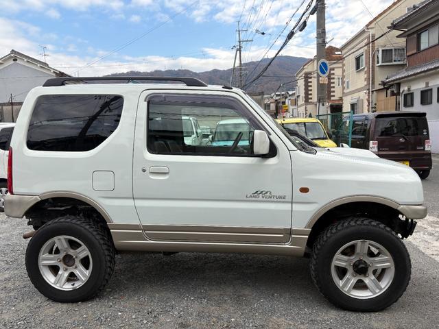 ジムニー ランドベンチャー 前席パワーウインドウ リフトアップ車 助手席エアバック 運転席エアバッグ 革シート 4WD車 キーレス付 PS 衝突安全ボディ ABS付 シートヒータ ETC ATエアコン(10枚目)