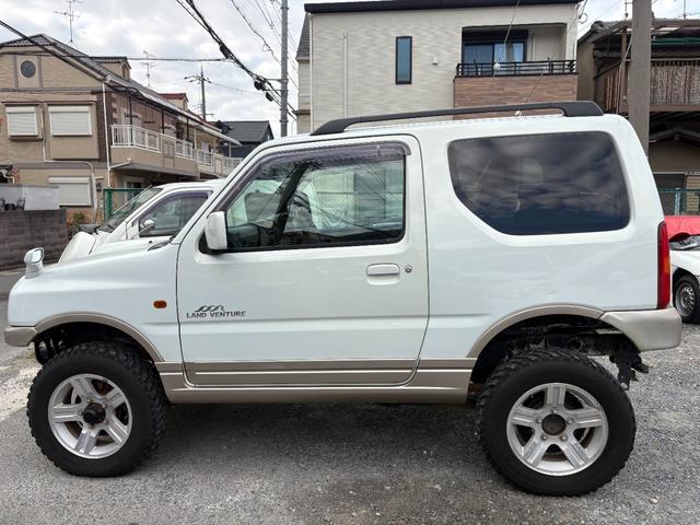 ジムニー ランドベンチャー 前席パワーウインドウ リフトアップ車 助手席エアバック 運転席エアバッグ 革シート 4WD車 キーレス付 PS 衝突安全ボディ ABS付 シートヒータ ETC ATエアコン(11枚目)