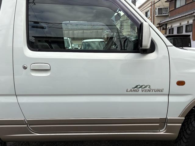 ジムニー ランドベンチャー 前席パワーウインドウ リフトアップ車 助手席エアバック 運転席エアバッグ 革シート 4WD車 キーレス付 PS 衝突安全ボディ ABS付 シートヒータ ETC ATエアコン(13枚目)