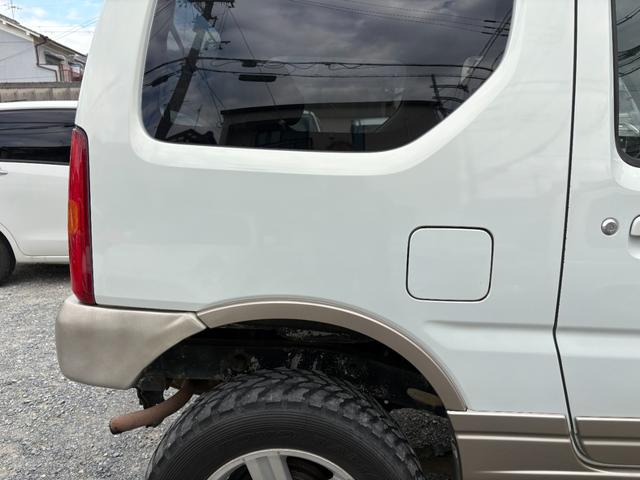 ジムニー ランドベンチャー 前席パワーウインドウ リフトアップ車 助手席エアバック 運転席エアバッグ 革シート 4WD車 キーレス付 PS 衝突安全ボディ ABS付 シートヒータ ETC ATエアコン(14枚目)