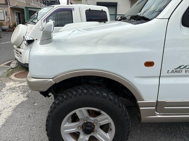 ジムニー ランドベンチャー 前席パワーウインドウ リフトアップ車 助手席エアバック 運転席エアバッグ 革シート 4WD車 キーレス付 PS 衝突安全ボディ ABS付 シートヒータ ETC ATエアコン(15枚目)