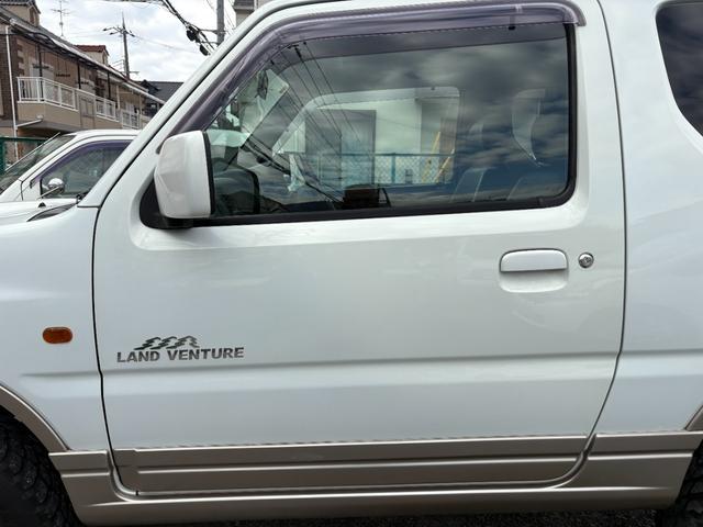ジムニー ランドベンチャー 前席パワーウインドウ リフトアップ車 助手席エアバック 運転席エアバッグ 革シート 4WD車 キーレス付 PS 衝突安全ボディ ABS付 シートヒータ ETC ATエアコン(16枚目)