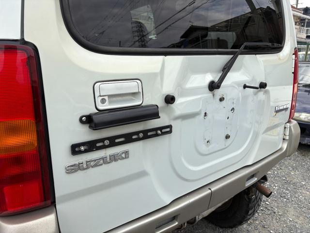 ジムニー ランドベンチャー 前席パワーウインドウ リフトアップ車 助手席エアバック 運転席エアバッグ 革シート 4WD車 キーレス付 PS 衝突安全ボディ ABS付 シートヒータ ETC ATエアコン(18枚目)