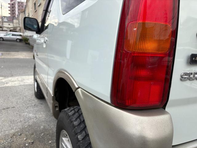 ジムニー ランドベンチャー 前席パワーウインドウ リフトアップ車 助手席エアバック 運転席エアバッグ 革シート 4WD車 キーレス付 PS 衝突安全ボディ ABS付 シートヒータ ETC ATエアコン(22枚目)