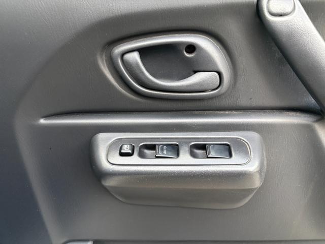 ジムニー ランドベンチャー 前席パワーウインドウ リフトアップ車 助手席エアバック 運転席エアバッグ 革シート 4WD車 キーレス付 PS 衝突安全ボディ ABS付 シートヒータ ETC ATエアコン(25枚目)