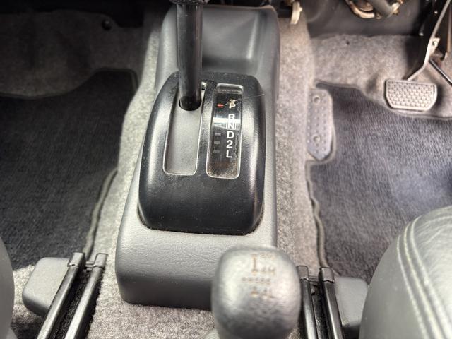 ジムニー ランドベンチャー 前席パワーウインドウ リフトアップ車 助手席エアバック 運転席エアバッグ 革シート 4WD車 キーレス付 PS 衝突安全ボディ ABS付 シートヒータ ETC ATエアコン(30枚目)