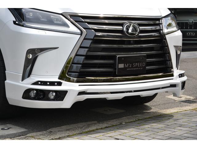 LX570ブラックシークエンス ブラックシークエンス ZEUS新車カスタムコンプリートエアロ(F/S/R)・デイライト・エアサスコントローラー・4本出マフラー・22インチAW(11枚目)