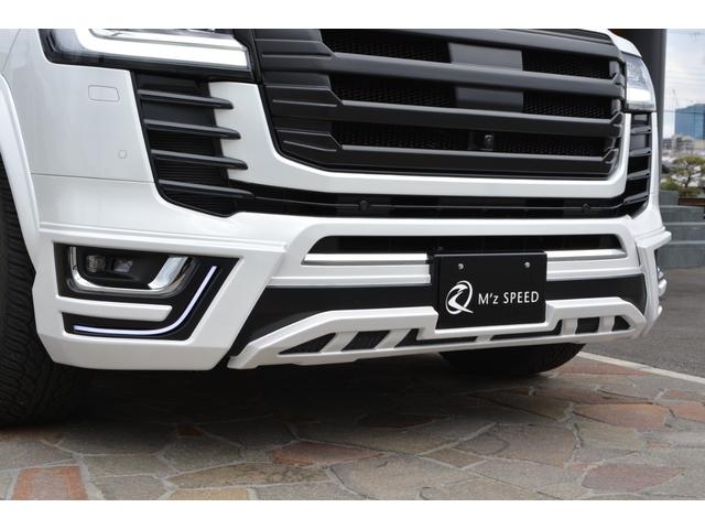 ランドクルーザー ＺＸ　ガソリン　７人乗　ＺＥＵＳカスタム　エアロ（Ｆ・Ｓ・Ｒ・ＦＧ・ＲＧ・ＦＤ・ＯＦ）・２２インチ・４本出しマフラー・ダウンサス・アルパイン製デジタルミラー・ＴコネクトＳＤナビ・ＪＢＬ・リヤエンターシステム・クールＢＯＸ（12枚目）