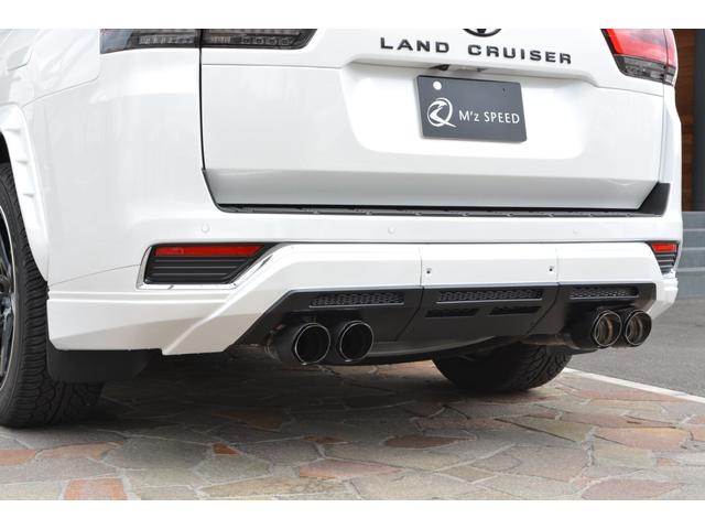 ランドクルーザー ＺＸ　ガソリン　７人乗　ＺＥＵＳカスタム　エアロ（Ｆ・Ｓ・Ｒ・ＦＧ・ＲＧ・ＦＤ・ＯＦ）・２２インチ・４本出しマフラー・ダウンサス・アルパイン製デジタルミラー・ＴコネクトＳＤナビ・ＪＢＬ・リヤエンターシステム・クールＢＯＸ（24枚目）
