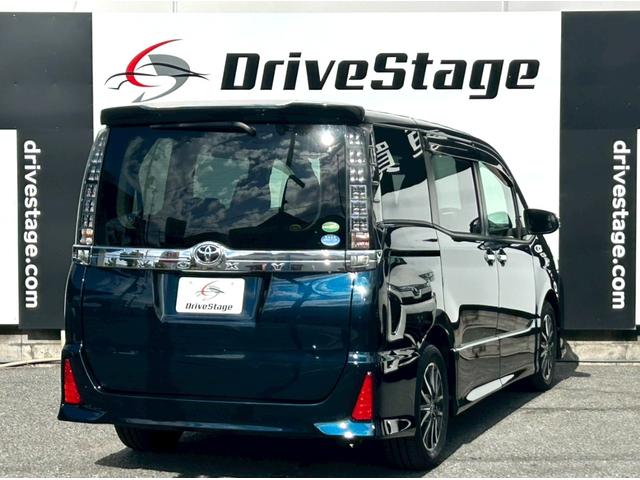 ヴォクシー ZS 煌 禁煙車 社外9インチナビ バックカメラ ETC Bluetooth 両側電動スライドドア 純正16インチアルミ LEDヘッドライト 7人乗り プッシュスタート スマートキー 車検整備付き(7枚目)