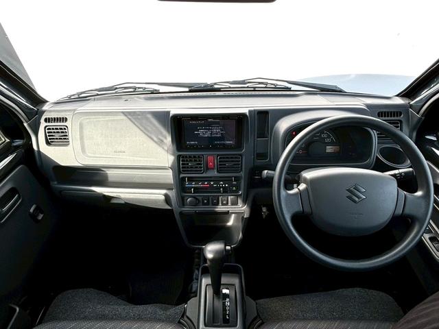 スーパーキャリイ Ｘ　禁煙車　三方開　４ＷＤ　ＡＴ車　クリアランスソナー　カロッツェリアナビ　フルセグ　オーバーヘッドコンソール　作業灯　荷台マット　ＨＩＤ　Ｂｌｕｅｔｏｏｔｈ　ＥＴＣ　　衝突軽減ブレーキ　車検整備付（9枚目）