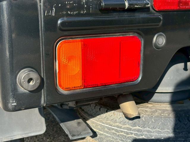 スーパーキャリイ Ｘ　禁煙車　三方開　４ＷＤ　ＡＴ車　クリアランスソナー　カロッツェリアナビ　フルセグ　オーバーヘッドコンソール　作業灯　荷台マット　ＨＩＤ　Ｂｌｕｅｔｏｏｔｈ　ＥＴＣ　　衝突軽減ブレーキ　車検整備付（36枚目）