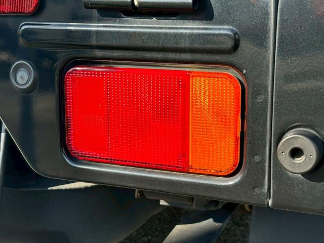 スーパーキャリイ Ｘ　禁煙車　三方開　４ＷＤ　ＡＴ車　クリアランスソナー　カロッツェリアナビ　フルセグ　オーバーヘッドコンソール　作業灯　荷台マット　ＨＩＤ　Ｂｌｕｅｔｏｏｔｈ　ＥＴＣ　　衝突軽減ブレーキ　車検整備付（37枚目）