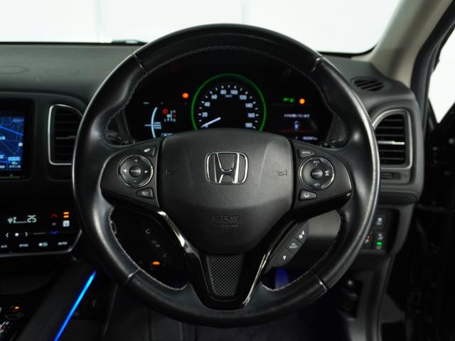 ヴェゼル ハイブリッドＺ・ホンダセンシング　ナビ　Ｒカメ　ＥＴＣ　クルコン　ＢＴ　地デジ　シートヒーター　ブレーキホールド付電動パーキングブレーキ　インテリア内装ブラック　運転席ハイトアジャスターシート　サイドバイザー　合皮コンビシート（7枚目）