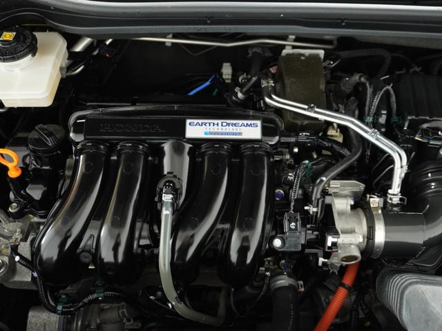 ヴェゼル ハイブリッドＺ・ホンダセンシング　ナビ　Ｒカメ　ＥＴＣ　クルコン　ＢＴ　地デジ　シートヒーター　ブレーキホールド付電動パーキングブレーキ　インテリア内装ブラック　運転席ハイトアジャスターシート　サイドバイザー　合皮コンビシート（68枚目）
