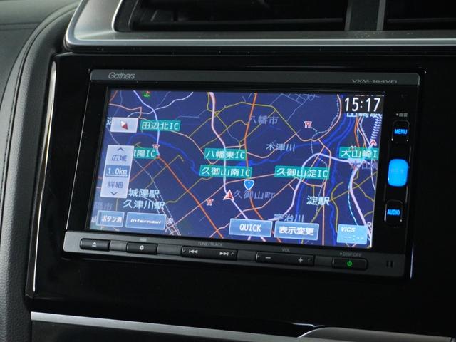 フィットハイブリッド Lパッケージ ナビ 地デジ DVD CD リアカメラ ETC インテリア内装ブラック 運転席ハイトアジャスターシート フロントグラデーションガラス アームレスト 合皮コンビシート 社外アルミホイル オートエアコン.(2枚目)