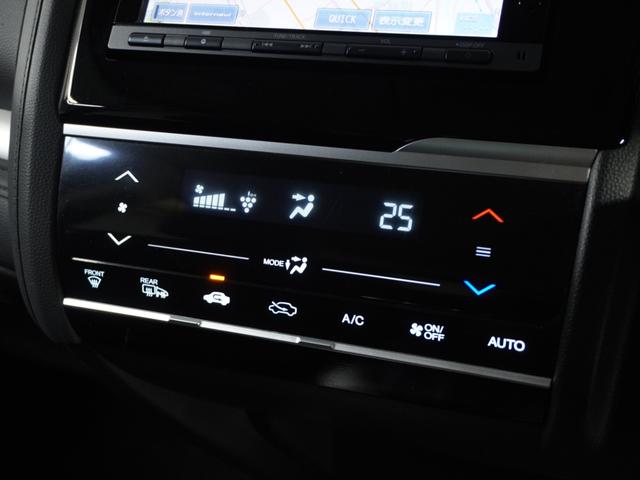 フィットハイブリッド Lパッケージ ナビ 地デジ DVD CD リアカメラ ETC インテリア内装ブラック 運転席ハイトアジャスターシート フロントグラデーションガラス アームレスト 合皮コンビシート 社外アルミホイル オートエアコン.(9枚目)