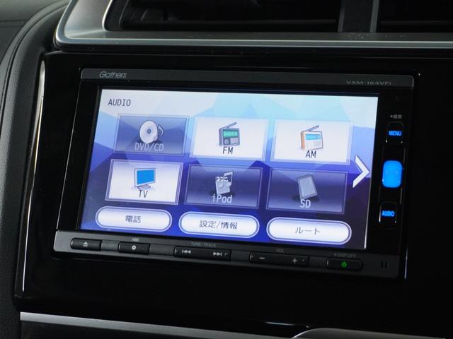 フィットハイブリッド Lパッケージ ナビ 地デジ DVD CD リアカメラ ETC インテリア内装ブラック 運転席ハイトアジャスターシート フロントグラデーションガラス アームレスト 合皮コンビシート 社外アルミホイル オートエアコン.(29枚目)