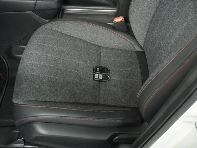 フィット e:HEVホーム20周年特別仕様車カーサ 1オ-ナ ナビ Rカメ Dレコ前後 ETC2.0 運転席ハイトアジャスターシート シートヒーター 合皮コンビシート サイドバイザー ウインカーミラー ブレーキホールド付電動パーキングブレーキ(61枚目)