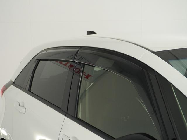 フィット e:HEVホーム20周年特別仕様車カーサ 1オ-ナ ナビ Rカメ Dレコ前後 ETC2.0 運転席ハイトアジャスターシート シートヒーター 合皮コンビシート サイドバイザー ウインカーミラー ブレーキホールド付電動パーキングブレーキ(63枚目)