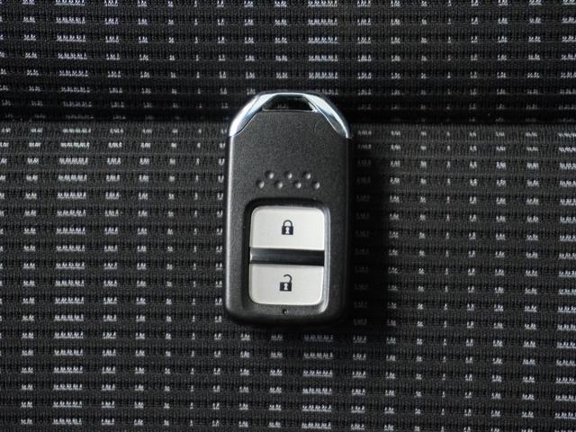 ヴェゼル ハイブリッドX・ホンダセンシング 1オ-ナ- ナビ Dレコ Rカメ ETC クルコン BT 運転席ハイトアジャスターシート ドアバイザー インテリア内装ブラック 合皮コンビシート 運転席ハイトアジャスターシート 後席跳ね上げシート.(18枚目)