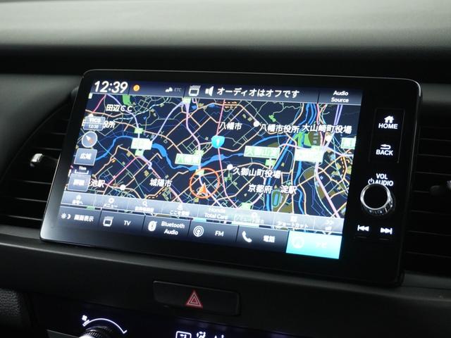 フィット e:HEVホーム 1オ-ナ- ナビ Rカメ ETC2.0 地デジ BT接続 LED 運転席ハイトアジャスターシート インテリア内装ブラック ブレーキホールド付電動パーキングブレーキ 合皮コンビシート オートエアコン.(2枚目)