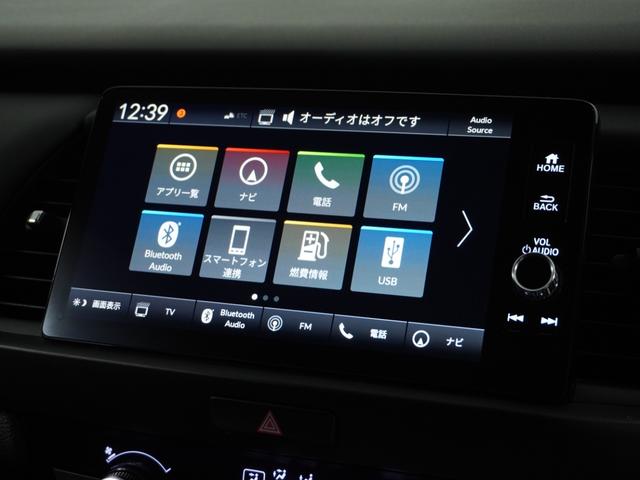 フィット e:HEVホーム 1オ-ナ- ナビ Rカメ ETC2.0 地デジ BT接続 LED 運転席ハイトアジャスターシート インテリア内装ブラック ブレーキホールド付電動パーキングブレーキ 合皮コンビシート オートエアコン.(3枚目)