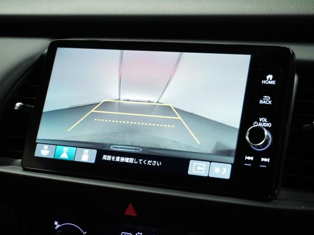 フィット e:HEVホーム 1オ-ナ- ナビ Rカメ ETC2.0 地デジ BT接続 LED 運転席ハイトアジャスターシート インテリア内装ブラック ブレーキホールド付電動パーキングブレーキ 合皮コンビシート オートエアコン.(4枚目)