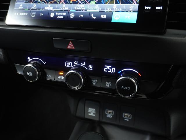 フィット e:HEVホーム 1オ-ナ- ナビ Rカメ ETC2.0 地デジ BT接続 LED 運転席ハイトアジャスターシート インテリア内装ブラック ブレーキホールド付電動パーキングブレーキ 合皮コンビシート オートエアコン.(9枚目)