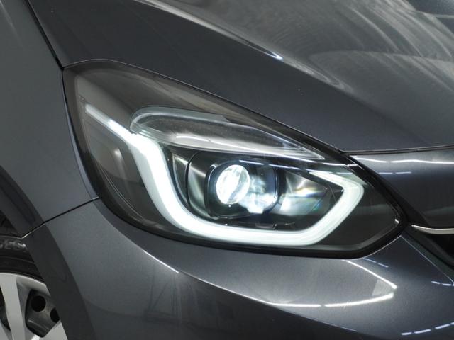 フィット e:HEVホーム 1オ-ナ- ナビ Rカメ ETC2.0 地デジ BT接続 LED 運転席ハイトアジャスターシート インテリア内装ブラック ブレーキホールド付電動パーキングブレーキ 合皮コンビシート オートエアコン.(13枚目)