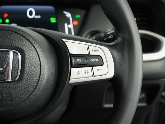 フィット e:HEVホーム 1オ-ナ- ナビ Rカメ ETC2.0 地デジ BT接続 LED 運転席ハイトアジャスターシート インテリア内装ブラック ブレーキホールド付電動パーキングブレーキ 合皮コンビシート オートエアコン.(20枚目)