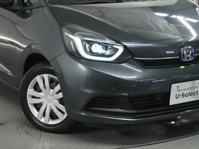 フィット e:HEVホーム 1オ-ナ- ナビ Rカメ ETC2.0 地デジ BT接続 LED 運転席ハイトアジャスターシート インテリア内装ブラック ブレーキホールド付電動パーキングブレーキ 合皮コンビシート オートエアコン.(30枚目)