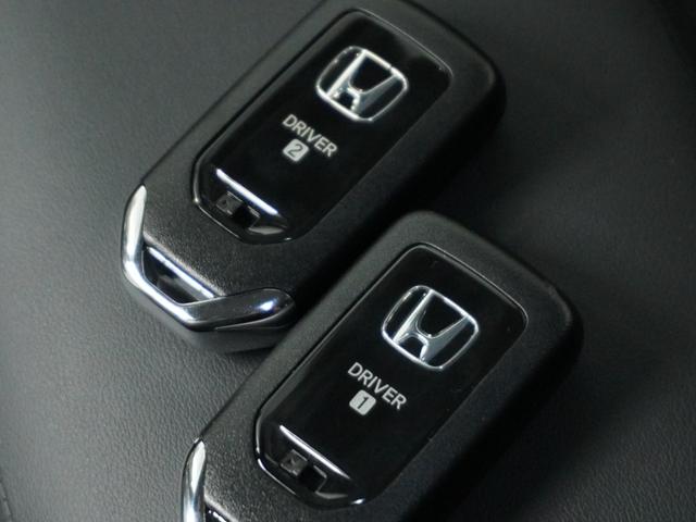 フィット e:HEVホーム 1オ-ナ- ナビ Rカメ ETC2.0 地デジ BT接続 LED 運転席ハイトアジャスターシート インテリア内装ブラック ブレーキホールド付電動パーキングブレーキ 合皮コンビシート オートエアコン.(32枚目)