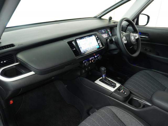 フィット e:HEVホーム 1オ-ナ- ナビ Rカメ ETC2.0 地デジ BT接続 LED 運転席ハイトアジャスターシート インテリア内装ブラック ブレーキホールド付電動パーキングブレーキ 合皮コンビシート オートエアコン.(33枚目)