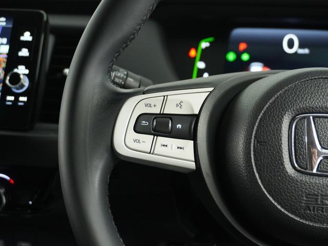 フィット e:HEVホーム 1オ-ナ- ナビ Rカメ ETC2.0 地デジ BT接続 LED 運転席ハイトアジャスターシート インテリア内装ブラック ブレーキホールド付電動パーキングブレーキ 合皮コンビシート オートエアコン.(49枚目)