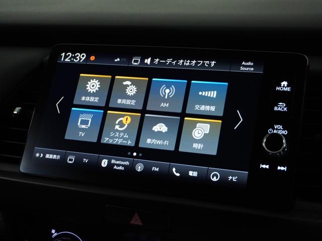 フィット e:HEVホーム 1オ-ナ- ナビ Rカメ ETC2.0 地デジ BT接続 LED 運転席ハイトアジャスターシート インテリア内装ブラック ブレーキホールド付電動パーキングブレーキ 合皮コンビシート オートエアコン.(58枚目)