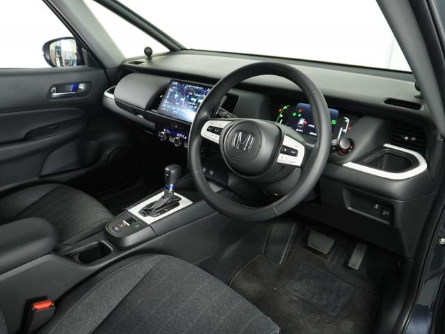 フィット e:HEVホーム 1オ-ナ- ナビ Rカメ ETC2.0 地デジ BT接続 LED 運転席ハイトアジャスターシート インテリア内装ブラック ブレーキホールド付電動パーキングブレーキ 合皮コンビシート オートエアコン.(63枚目)