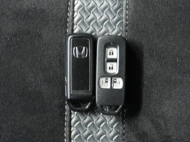 N-BOXカスタム Lターボ ナビ Rカメ ETC 両電扉 BT パドルシフト LED パドルシフト サイドバイザー シートバックテーブル 運転席ハイトアジャスターシート 合皮コンビシート インテリア内装ブラック 後席シェード(18枚目)