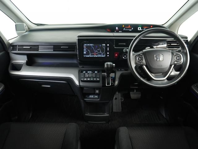 ステップワゴンスパーダ スパーダホンダセンシング ナビ 両側電動扉 バックカメラ ETC 三列シート サイドバイザー わくわくゲート 後席シェード 革巻ステアリング 運転席ハイトアジャスターシート デジパネ インテリア内装ブラック パドルシフト(7枚目)