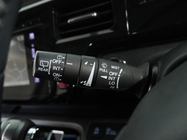 ステップワゴンスパーダ スパーダホンダセンシング ナビ 両側電動扉 バックカメラ ETC 三列シート サイドバイザー わくわくゲート 後席シェード 革巻ステアリング 運転席ハイトアジャスターシート デジパネ インテリア内装ブラック パドルシフト(57枚目)