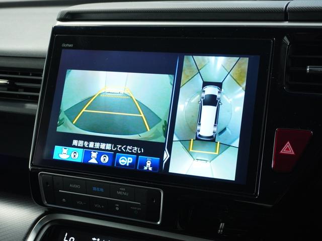 ステップワゴンスパーダ スパーダハイブリッドG・EXホンダセンシング 〇ナビ 後席モニタ 全周囲カメ ETC2.0 両電扉 BT 地デジ ドアバイザー わくわくゲート 三列シート 後席シェード シートヒーター 合皮コンビシート ウインカーミラー インテリア内装ブラック(3枚目)