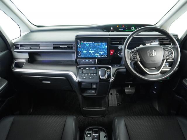 ステップワゴンスパーダ スパーダハイブリッドG・EXホンダセンシング 〇ナビ 後席モニタ 全周囲カメ ETC2.0 両電扉 BT 地デジ ドアバイザー わくわくゲート 三列シート 後席シェード シートヒーター 合皮コンビシート ウインカーミラー インテリア内装ブラック(8枚目)