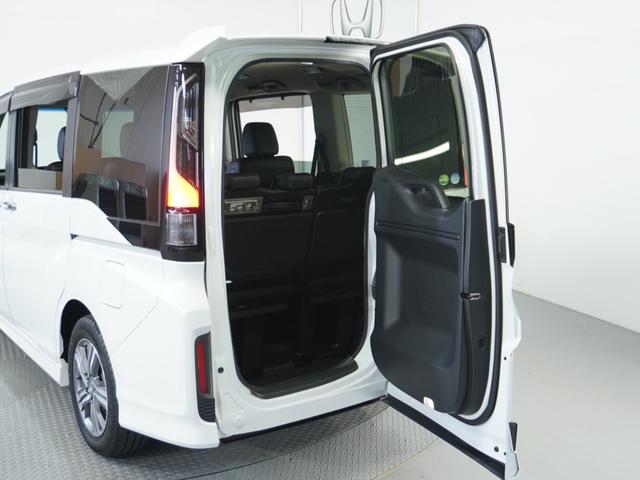 ステップワゴンスパーダ スパーダハイブリッドG・EXホンダセンシング 〇ナビ 後席モニタ 全周囲カメ ETC2.0 両電扉 BT 地デジ ドアバイザー わくわくゲート 三列シート 後席シェード シートヒーター 合皮コンビシート ウインカーミラー インテリア内装ブラック(18枚目)