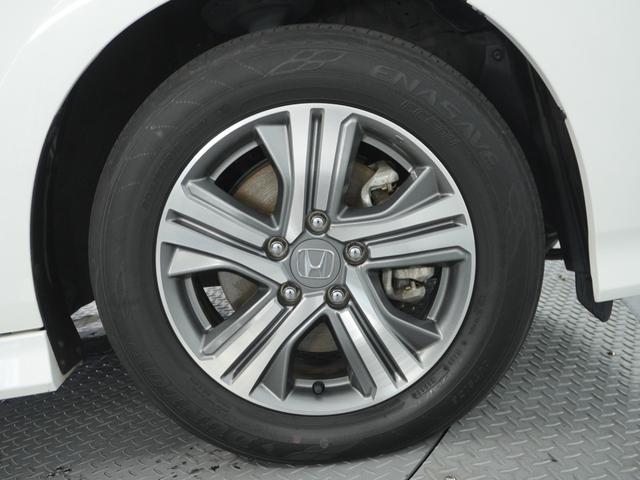 ステップワゴンスパーダ スパーダハイブリッドG・EXホンダセンシング 〇ナビ 後席モニタ 全周囲カメ ETC2.0 両電扉 BT 地デジ ドアバイザー わくわくゲート 三列シート 後席シェード シートヒーター 合皮コンビシート ウインカーミラー インテリア内装ブラック(19枚目)