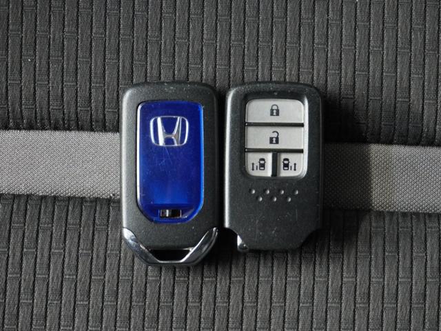 ステップワゴンスパーダ スパーダハイブリッドG・EXホンダセンシング 〇ナビ 後席モニタ 全周囲カメ ETC2.0 両電扉 BT 地デジ ドアバイザー わくわくゲート 三列シート 後席シェード シートヒーター 合皮コンビシート ウインカーミラー インテリア内装ブラック(20枚目)