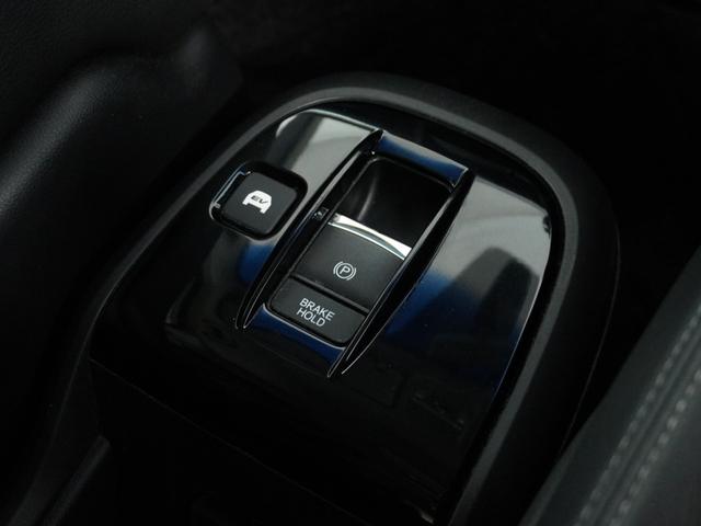 ステップワゴンスパーダ スパーダハイブリッドG・EXホンダセンシング 〇ナビ 後席モニタ 全周囲カメ ETC2.0 両電扉 BT 地デジ ドアバイザー わくわくゲート 三列シート 後席シェード シートヒーター 合皮コンビシート ウインカーミラー インテリア内装ブラック(26枚目)